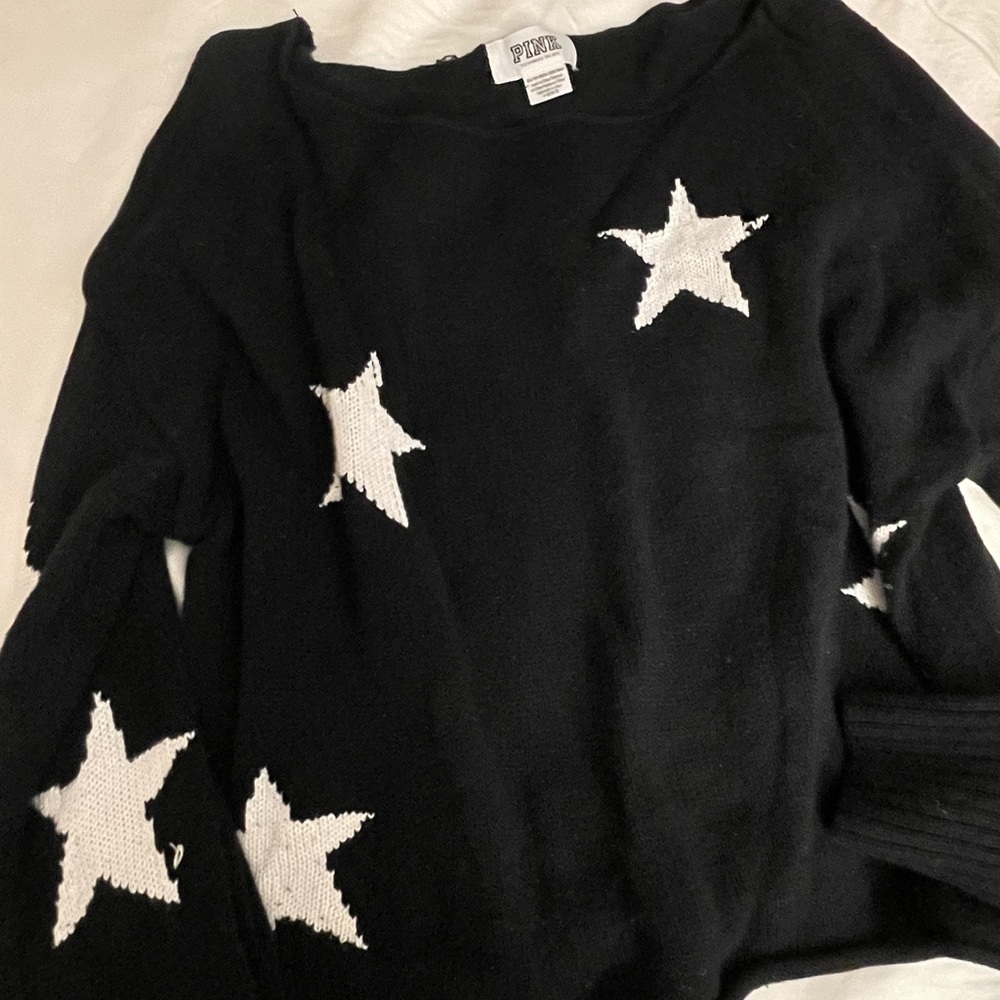 Black sweater with stars